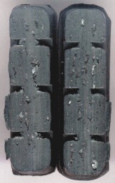 Lumps of metal and pits adorning unmaintained original pre-2000 Brompton brake blocks
