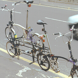 Dave's trailer equipped with a bike rack, holding another Brompton